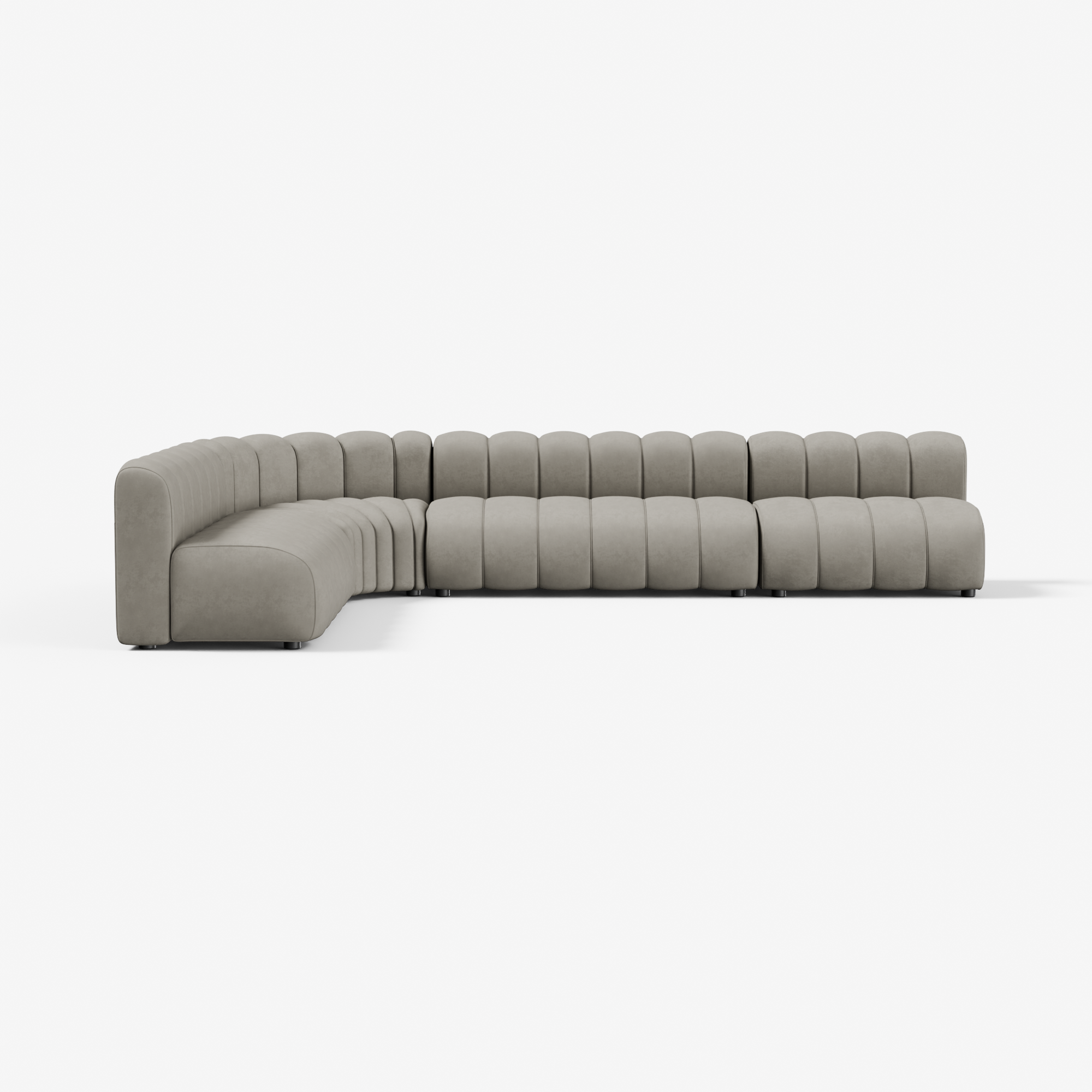 Nutmeg Beige Cosmo L-shaped 7-seater sofa with a right-angled modular build, offering layered cushioning and generous seating for lounge or lobby setups.