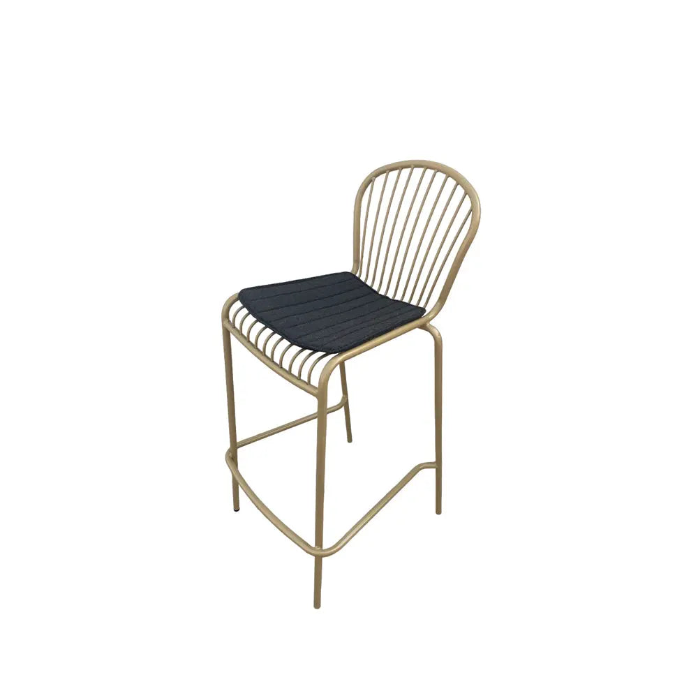 Corset bar stool champagne gold with black seat pad Desert River Rentals