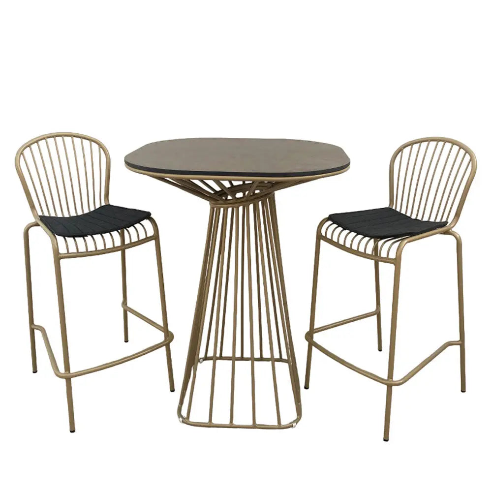 Corset bar stool champagne gold with black seat pad Desert River Rentals