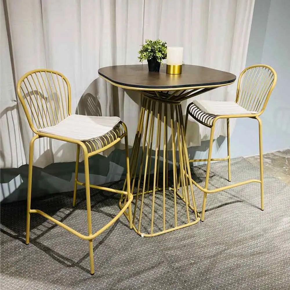 Corset bar stool champagne gold with white seat pad Desert River Rentals