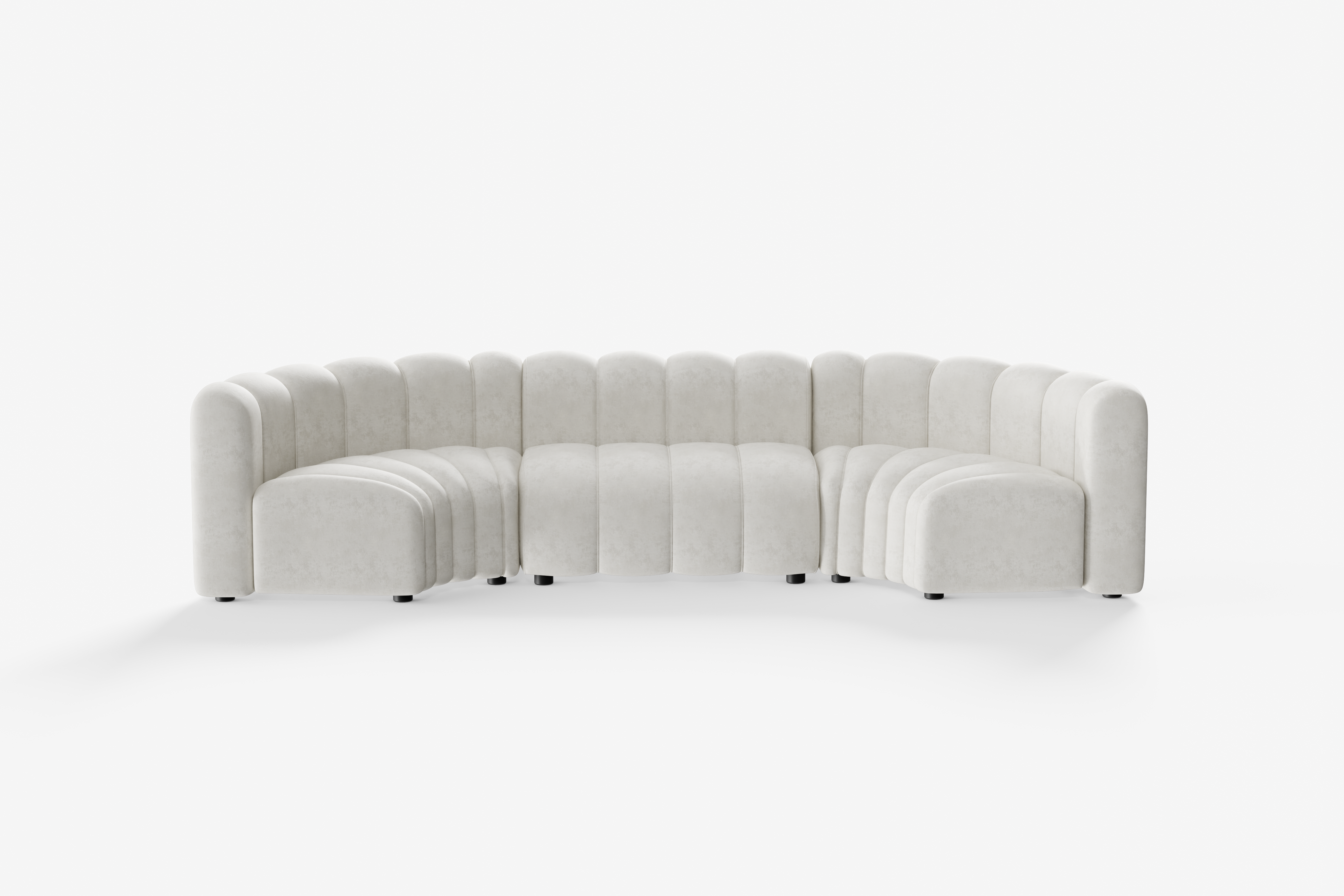 Cosmo Concave Small 3-seater in vanilla white with symmetrical inward curve and soft upholstery