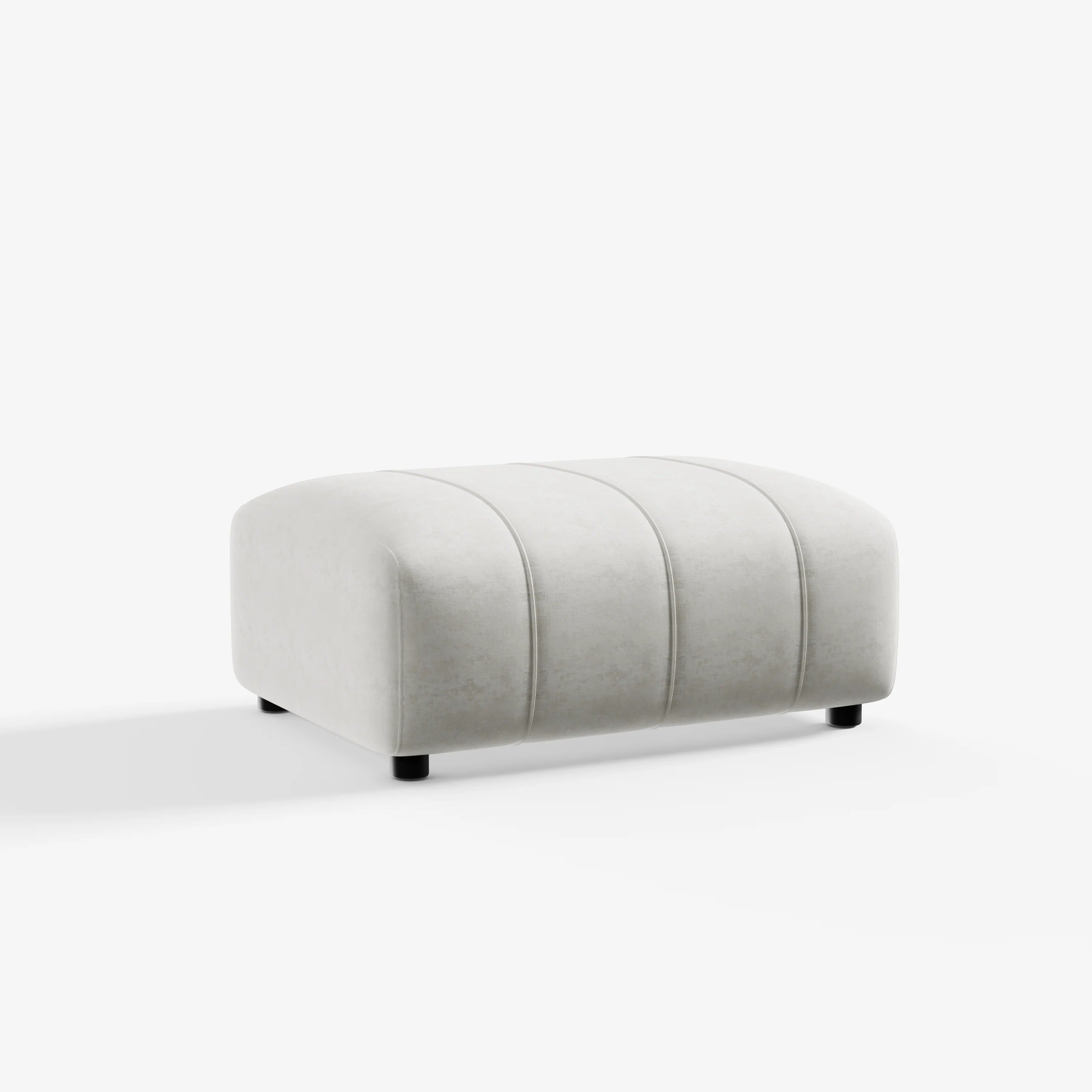 Cosmo Ottoman 1-seater in vanilla white with rounded edges and soft upholstery.