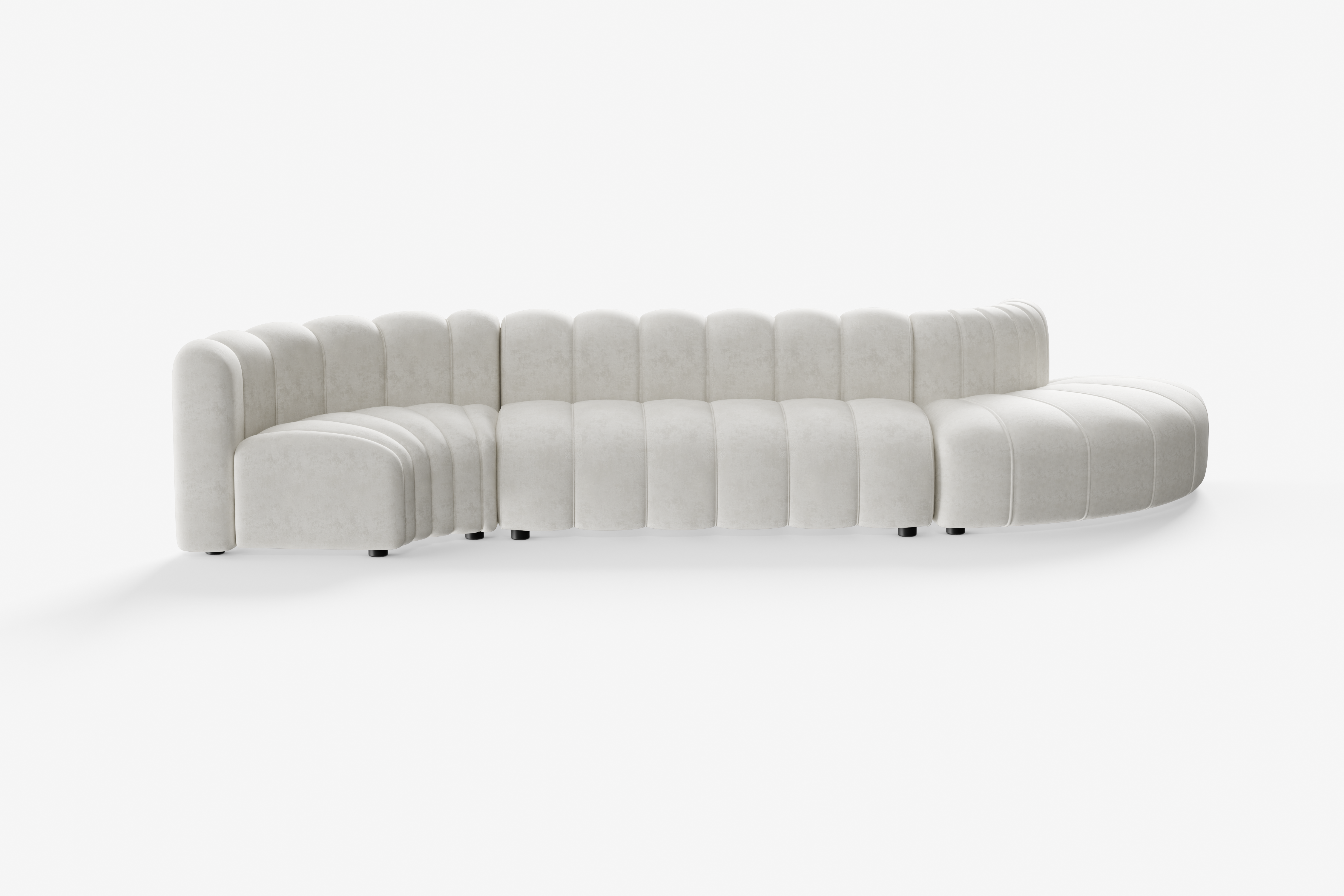 Cosmo S-shape 5-seater in vanilla white featuring curved backrest and sculptural form