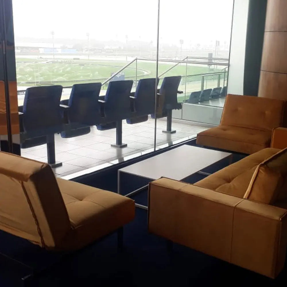 Enigma lounge chair ochre yellow velvet Desert River Rentals