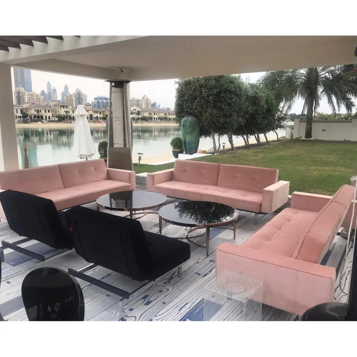 Enigma sofa with arm rest blush pink velvet Desert River Rentals