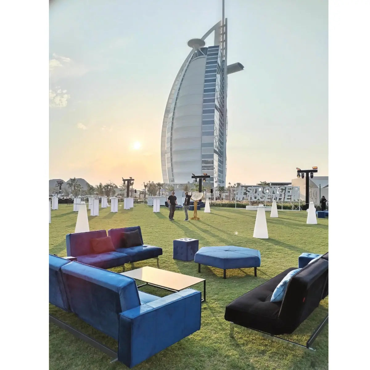 Enigma sofa with arm rest forest royal blue velvet Desert River Rentals