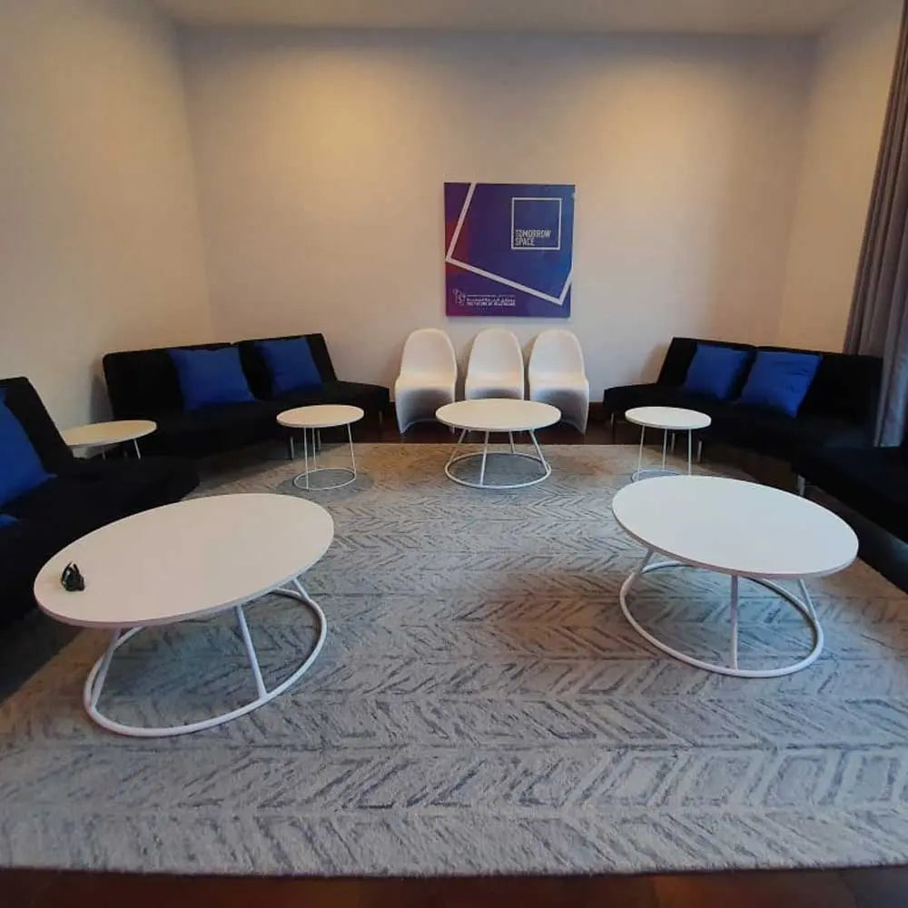 Geo coffee table white round Desert River Rentals