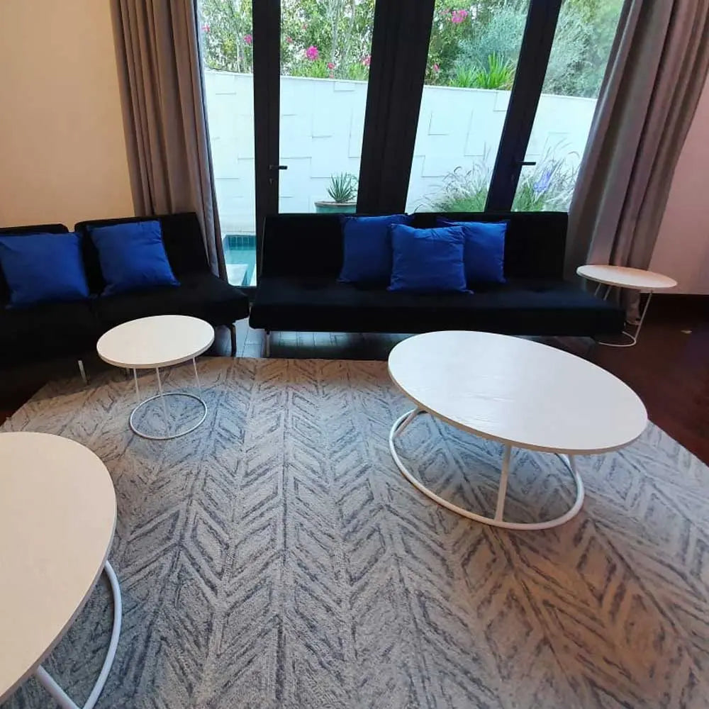 Geo coffee table white round Desert River Rentals