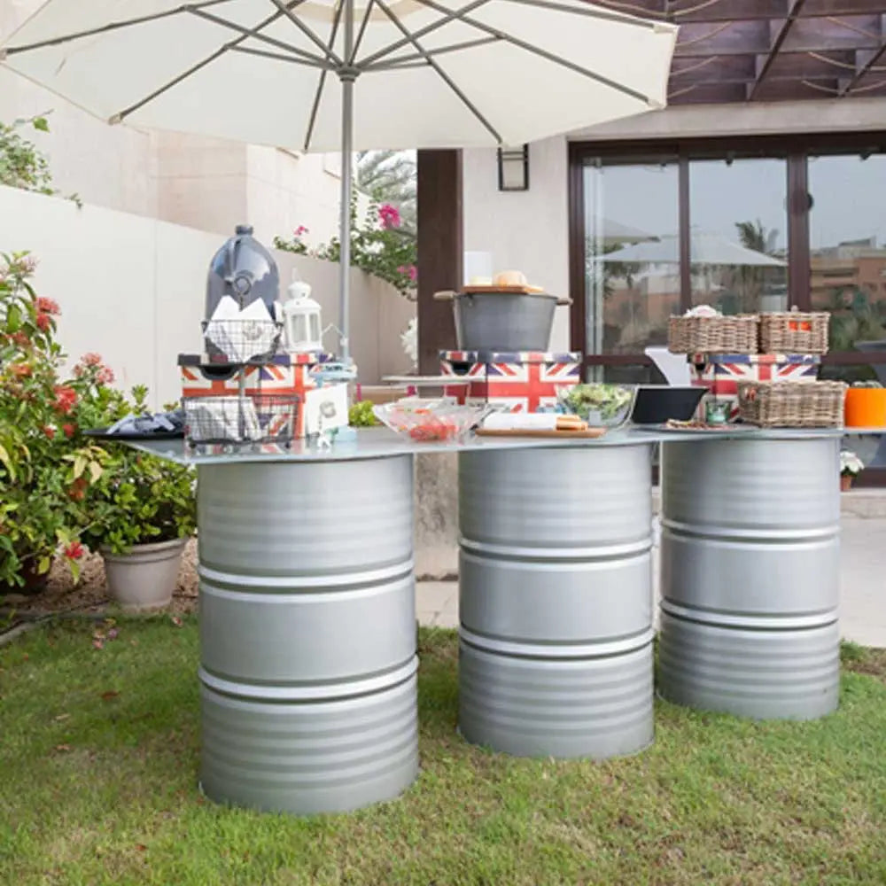 Oil drum buffet table silver Desert River Rentals